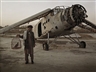 Simon Norfolk, Old biplane on a display plinth at the Exhibition Grounds in Kabul from Afghanistan: Chronotopia, 2001-2002