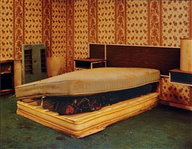 Taryn Simon, Larry Mayes, Scene of arrest, The Royal Inn, Gary, Indiana, Police found Mayes hiding beneath a mattress in this room, Served 18.5 years of an 80-year sentence for Rape, Robbery and Unlawful Deviate Conduct, 2002