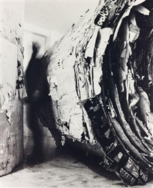 Santiago Sierra, 2 cylinders each measuring 250 X 250 cm, composed of posters that have been torn down