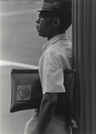 Roy DeCarava, Untitled (Man with portfolio)