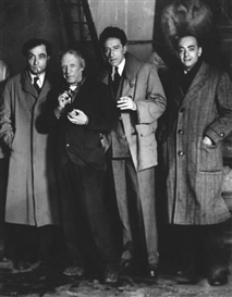 Brassaï, Pierre Reverdy, Picasso, Jean Cocteau, Brassaï in Picasso's atelier in the Rue des Grands-Augustins, Paris