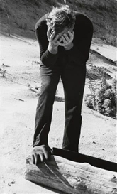 Paul Cadmus, A pair of photographs of Jared French leaning over a log and glove