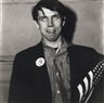 Diane Arbus, Neil Selkirk, Patriotic Young Man with a Flag, N.Y.C., 1967