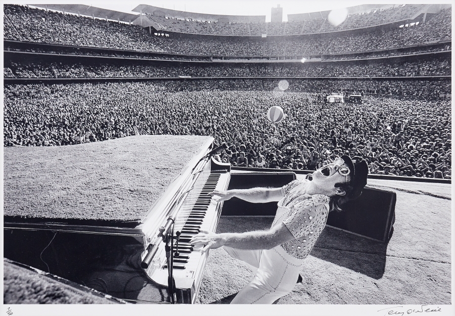 Elton John Singing at Dodger Stadium by Terry O'Neill