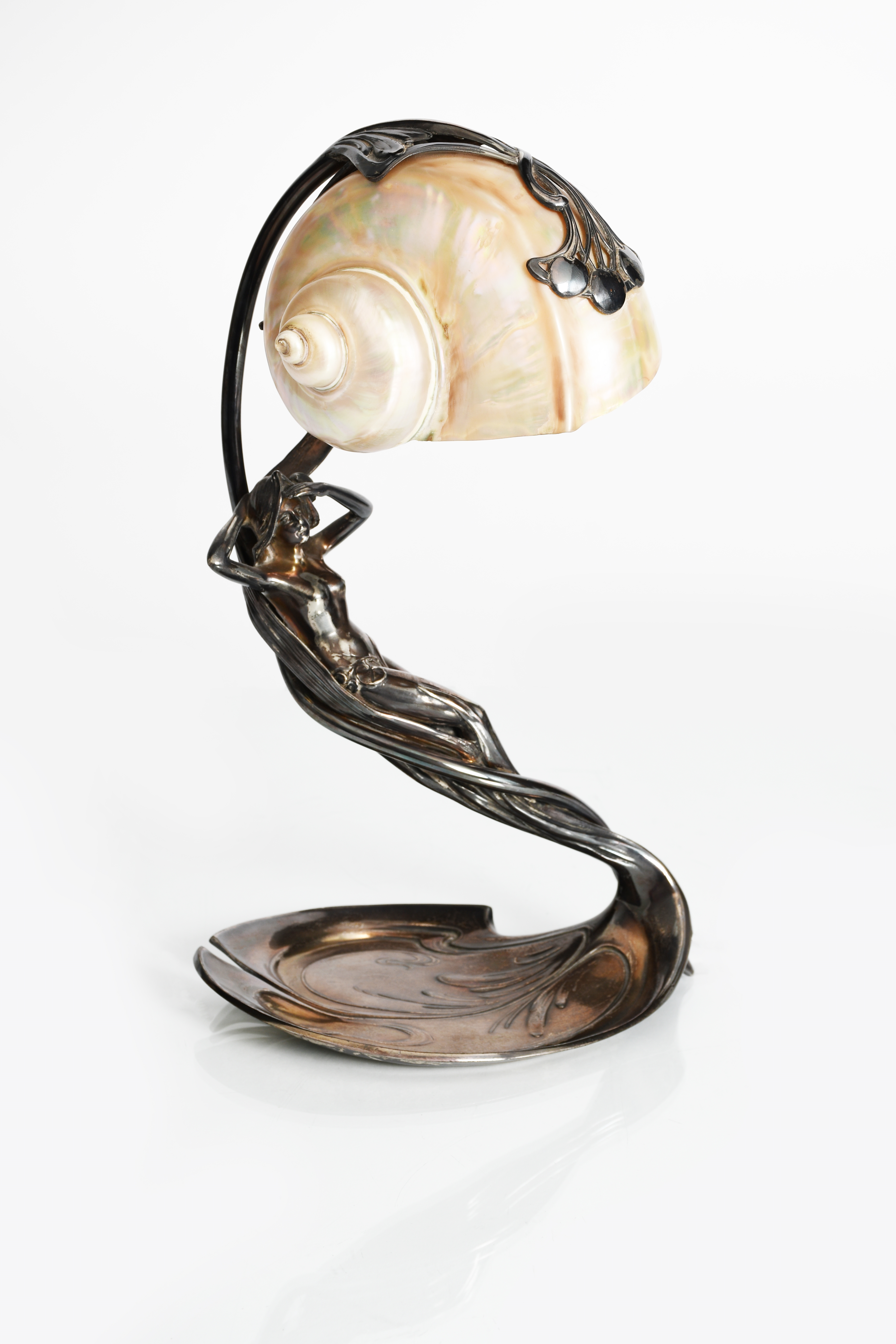 Explosieven Hangen lading Moritz Hacker | an Art Nouveau electroplated figural table lamp with  nautilus shell shade (1995) | MutualArt