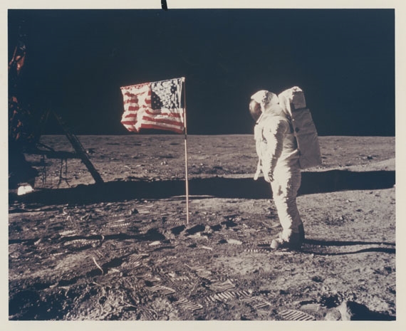 next to neil armstrong flag
