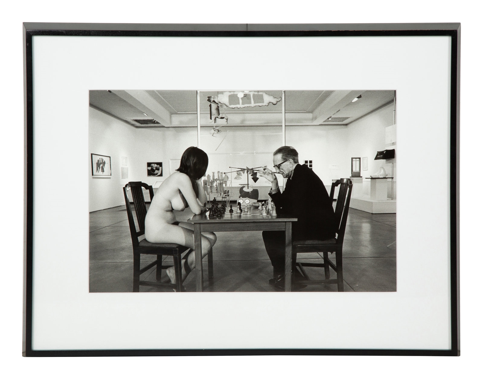 Julian Wasser | Marcel Duchamp Playing Chess with a Nude Eve Babitz |  MutualArt