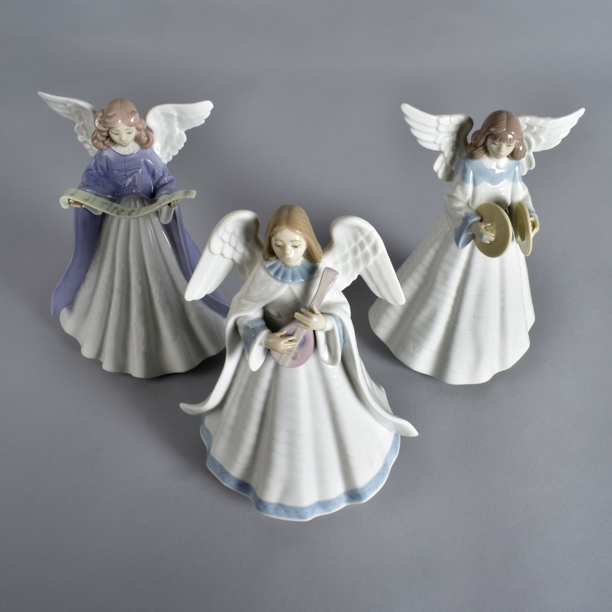 Lladro, Grouping of Three Lladro Porcelain Angel Figurines