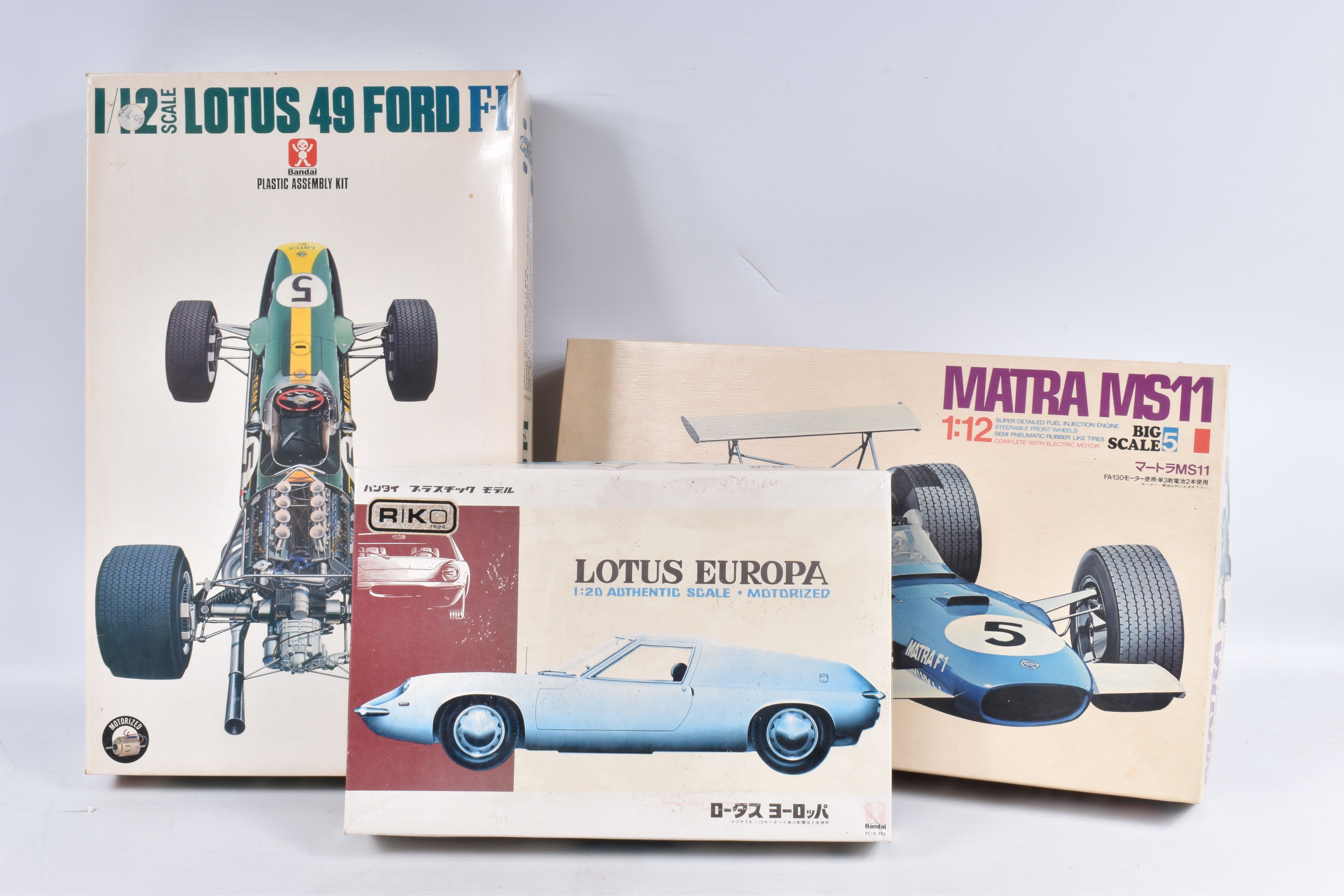Unknown | THREE UNBUILT MODEL KITS, to include a Tamiya Series No 