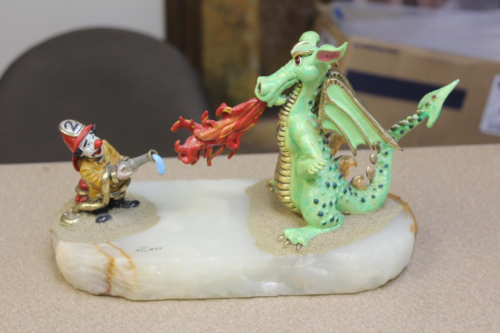 Ron Lee | Ron Lee Dragon and Fireman Sculpture | MutualArt