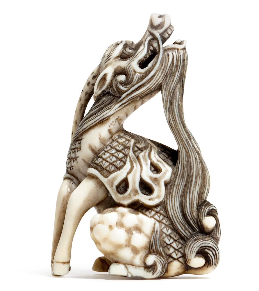 a-netsuke-of-a-seated-kirin-