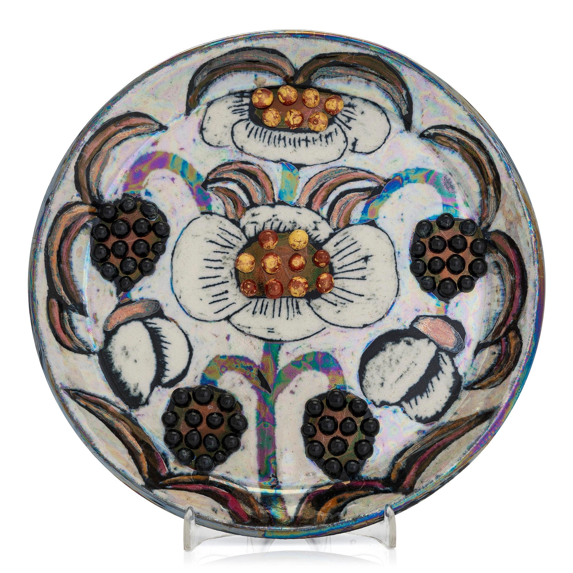 Birger Kaipiainen | a decorative stoneware plate, signed