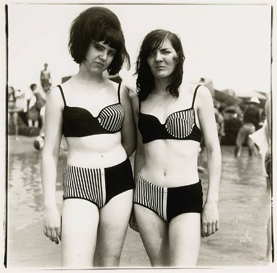 Two Girls in matching bathing suits, Coney Island, New York by Diane Arbus, 1967