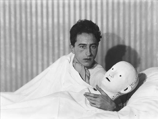 Jean Cocteau with mask by Berenice Abbott, 1927-1928
