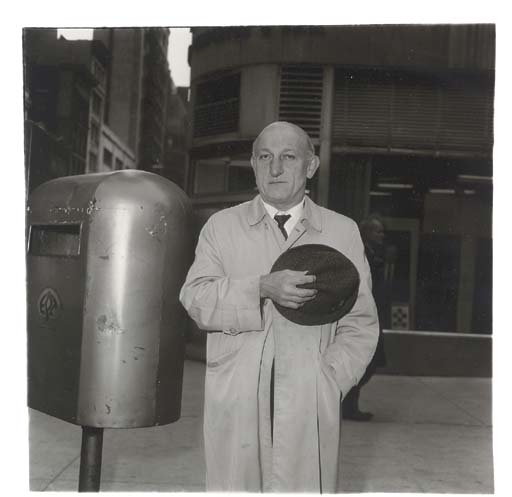 Man at a parade on Fifth Avenue, N.Y.C. by Diane Arbus, 1969