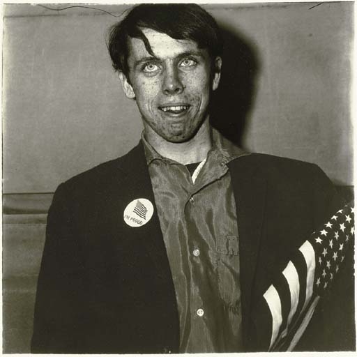 Patriotic young man with a flag, N.Y.C