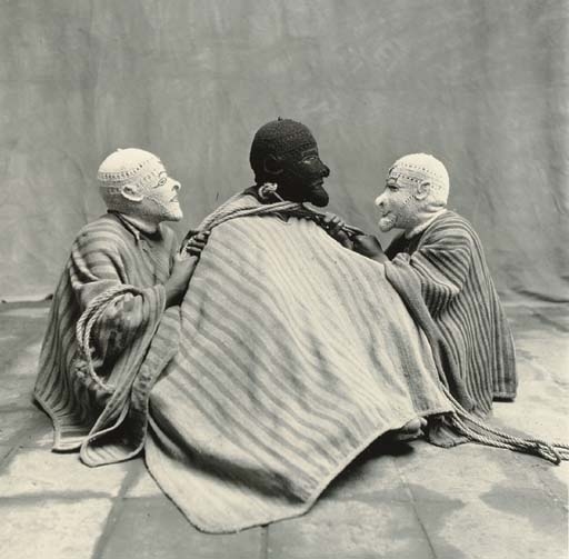 Three Sitting Men in Masks, Cuzco, Peru