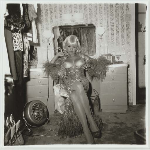 Topless dancer in her dressing room, San Francisco, Cal., 1968