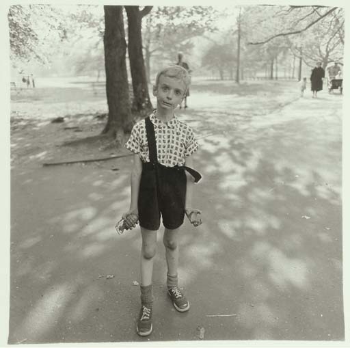 Child with a toy hand grenade in Central Park, N.Y.C., 1962