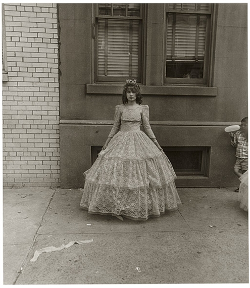 Young girl after the Puerto Rican parade, N.Y.C. 1963