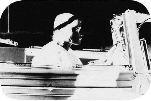 Untitled (Woman in a car) by Franz Roh