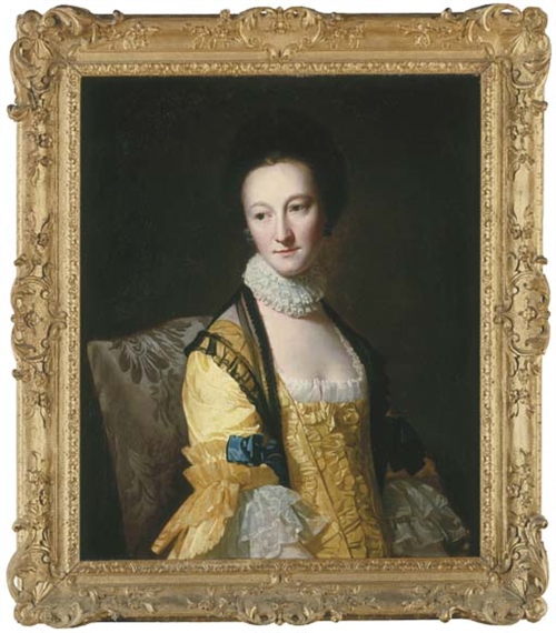 Portrait of Miss Andrewes, half-length, seated, in a yellow dress and black shawl with a lace ruff, in an interior by George Romney