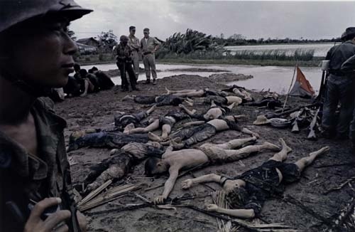 South Vietnamese and American Troops with Viet Cong Prisoners, Mekong Delta, Vietnam by Larry Burrows, 1963