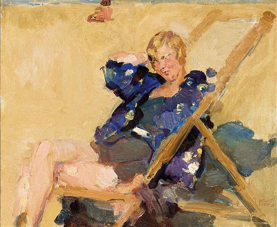 A LADY IN A BEACH CHAIR