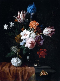 ANTWERP 1640 - 1691 A STILL LIFE OF VARIEGATED TULIPS, A ROSE, CARNATION, AN IRIS AND OTHER FLOWERS IN A GLASS VASE, RESTING ON A STONE LEDGE DRAPED WITH A CLOTH, TOGETHER WITH A BUTTERFLY - Nicolaes van Veerendael