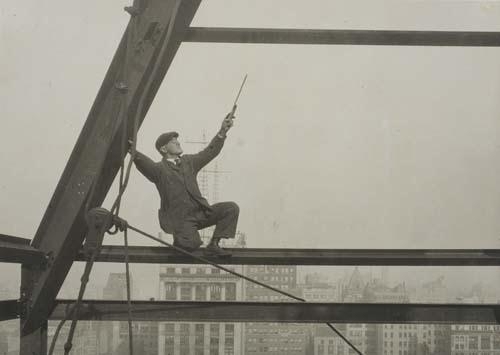 Empire State Building (Structural worker--boss directing work higher up) by Lewis Hine, 1930