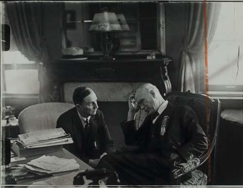 Senator Simeon D. Fess, the retiring chairman of the National Committee of the Republican Party, talking to Daniel Pomeroy in his office in the Congress Hotel by Erich Salomon, 1932