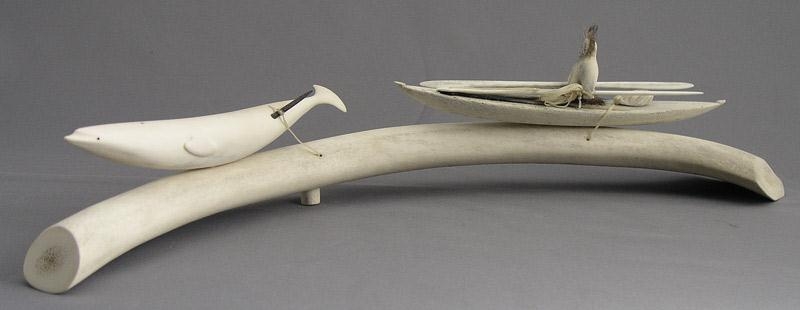 Artwork by Jim H. Raddi, HUNTER IN KAYAK WITH WHALE, Made of carved bone with fur and sinew accents on an antler base