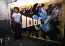 BLADE PAINTING HIS FIRST CANVAS IN BASEMENT OF HIS BRONX BUILDING, 1982 - Martha Cooper
