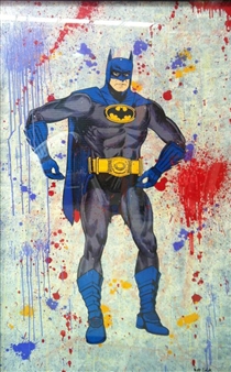A muscular figure in a dark suit with yellow accents stands confidently against a backdrop of colorful paint splatters.