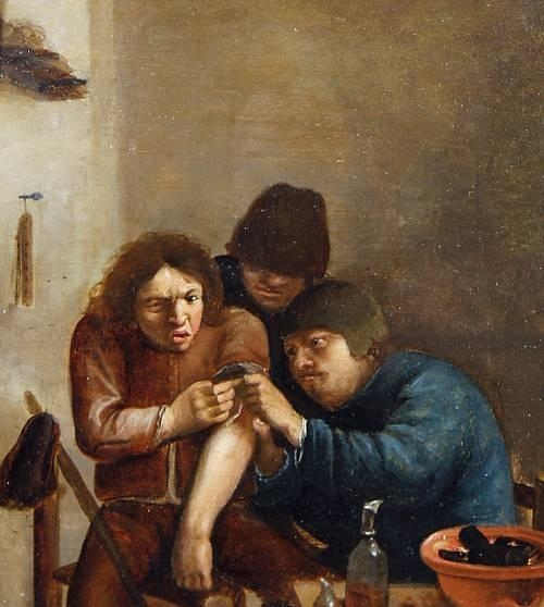 A peasant interior with a doctor medicating a patient's wound by Adriaen Brouwer