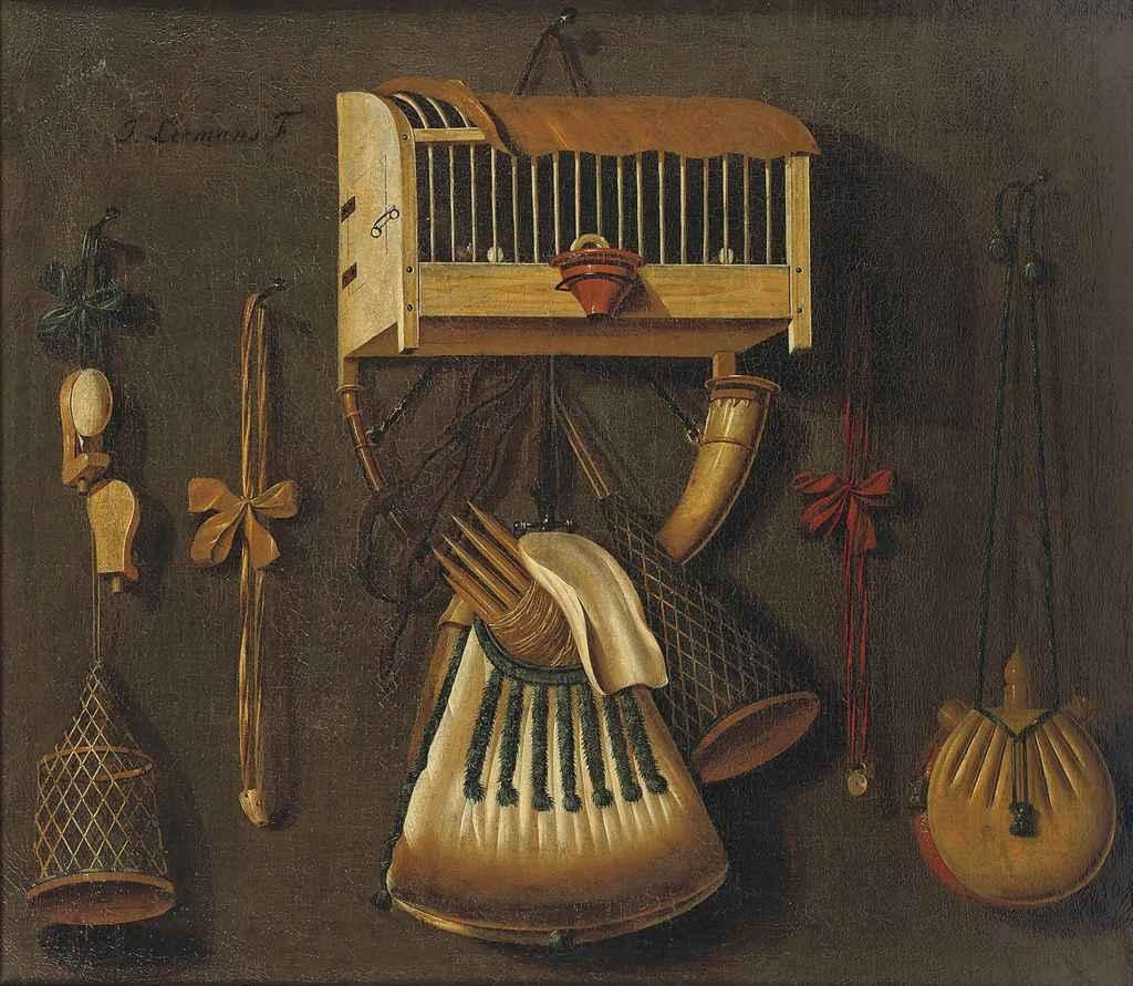 Johannes Leemans, A 'trompe l'oeil' still life with a bird in a cage, a  hunting horn, a bird whistle, and other hunting implements hanging on a  wall