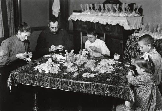 Untitled (family making flowers) by Lewis Hine, Circa 1910; printed circa 1920s
