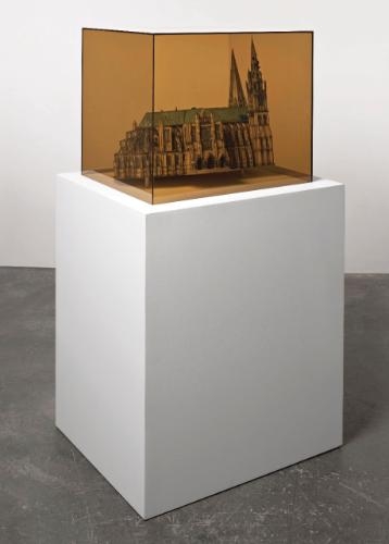 Artwork by Roger Hiorns, Leaning Chartres with Cobalt and Copper Crystals, Made of Card construction with cobalt and copper chemical growth, mounted on glass and wood trestle table with perspex cover underlit by two strip lights