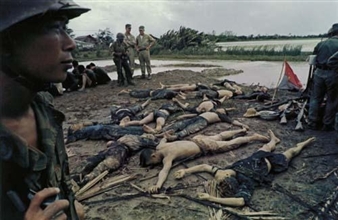 South Vietnamese and American troops with Viet Cong prisoners, Mekong Delta, Vietnam - Larry Burrows