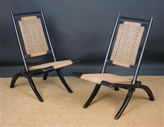 A pair of folding chairs - William Watt