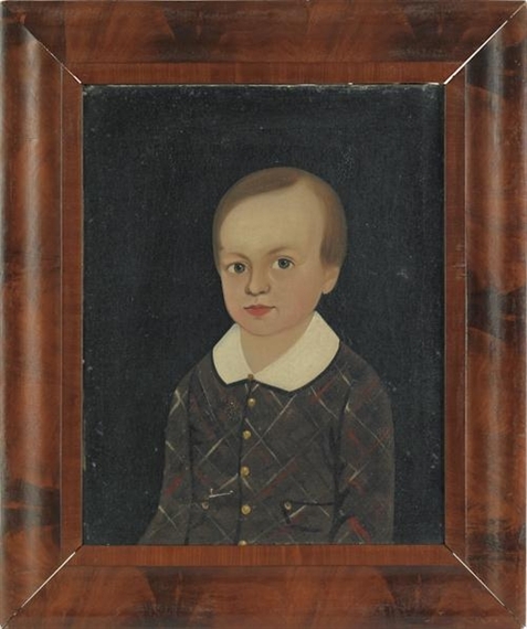 A formal portrait of a young boy in period clothing, framed in polished wood.