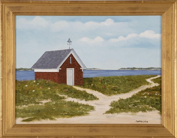 Red boathouse on the bay