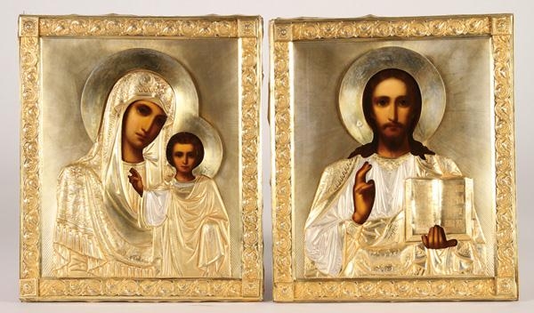 Artwork by Emelian Kusnetsov, A PAIR OF RUSSIAN WEDDING ICONS, Made of multi-piece, repousse and engraved gilded silver rizas in the Pan Slavic taste