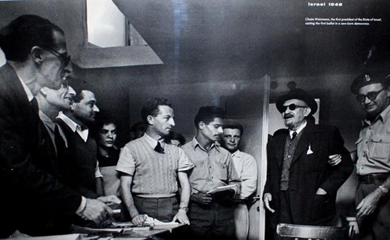 Chaim Weizman casts his ballot - Robert Capa