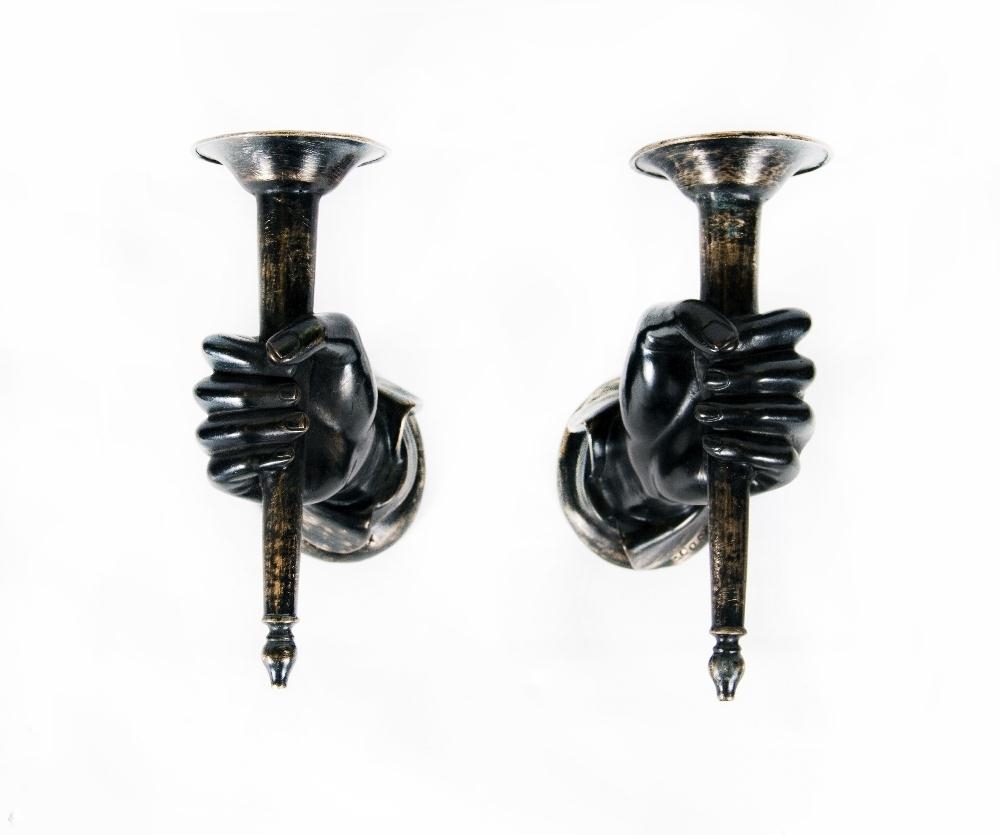 Horacio Cordero | Three pairs of Wall Sconces of a hand with a torch ...