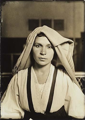 Immigrant, Ellis Island, circa 1907 by Lewis Hine, printed 1920s