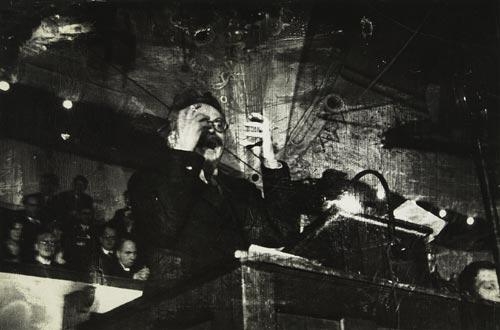 Leon Trotsky at a political rally by Robert Capa, 1932