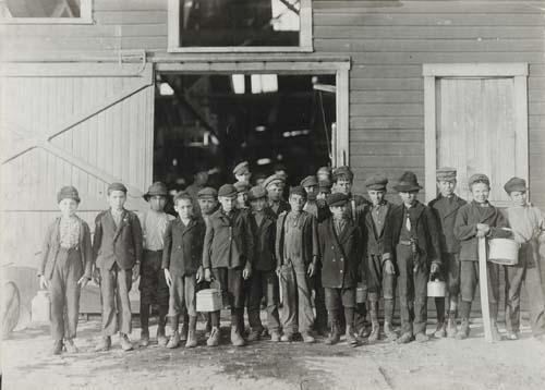 Young boys outside a factory by Lewis Hine, Circa 1910