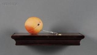 Artwork by Stepnanie Chubbuck, Glass Peach with Leash and Shelf, Made of Glass, steel cable, and wood