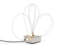 Artwork by Studio A.R.D.I.T.I., LAMPE DE TABLE BASSE TENSION "B.T.2", Made of Polished steel base, flexible steel son, bulb holder magnetic translucent plastic